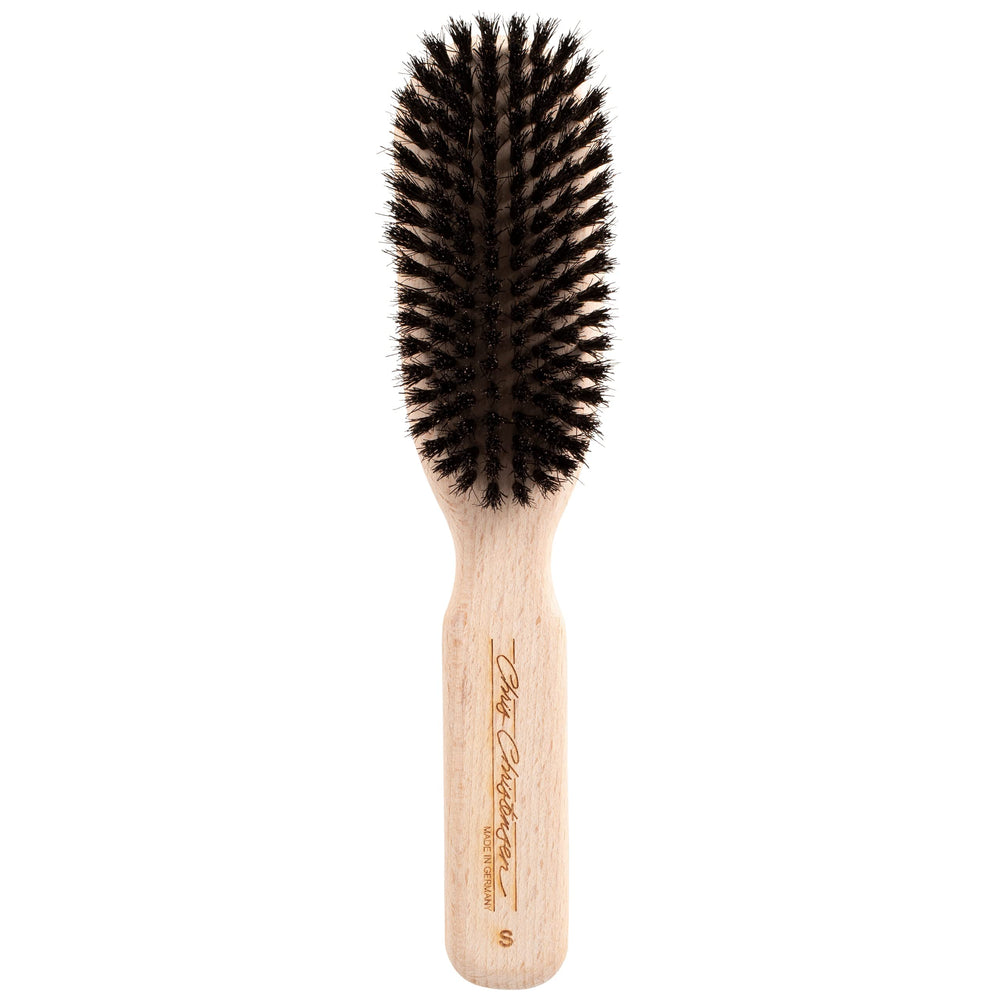 Chris Christensen boar dog brush with beech handle distributes natural oils for a healthy coat.