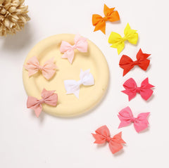 Clipband alligator-clip detail with textured teeth for secure grip during play