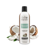 The Coat Handler conditioner bottle reduces shedding with moisture-boosting formula.