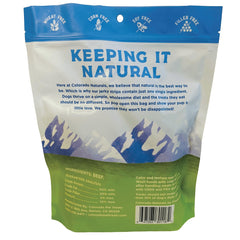 Colorado Naturals beef jerky strips closeup bite; chewy texture for training rewards.