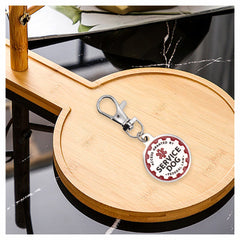 Consio puppy service dog tag lobster-clasp closeup shows secure attachment.