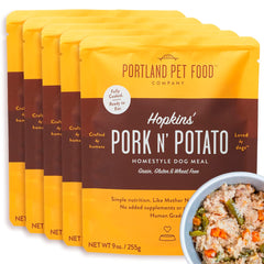 CRAFTED BY HUMANS LOVED BY DOGS Hopkin's Pork N’ Potato pouch ready-to-serve for quick wholesome meals.