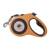 CROWN PAWS leash 16ft orange extended view enables controlled walks.