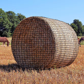 Dayimado large round bale hay net front view showing 1.5-inch mesh for slower grazing