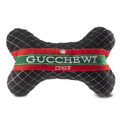 Dog Diggin Designs Runway Pup toy bone close-up, encourages engaging fetch with squeak.