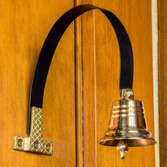 Dog Doorbell height-adjustment screws demonstrate adaptable setup for growing dogs
