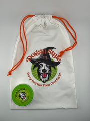Doggy Style paw balm being applied to a dog's paw with natural ingredients