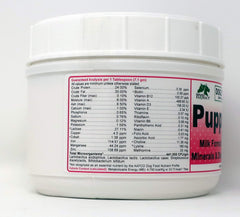 Dogzymes Puppy-Bac powder scoop shows precise mixing for reliable puppy nutrition.