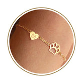 DONYUDE dog paw initial bracelet closeup showing dainty design for pet lovers.