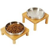 DoogCat elevated cat bowls on bamboo stand provide stable feeding for indoor cats.