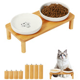 DoogCat elevated cat bowls stand on a bamboo base for space-saving feeding.