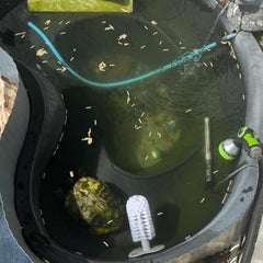 Secure suction cup attachment lets you position the brush anywhere in the tank