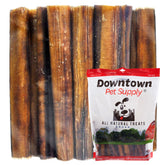 Downtown Pet Supply 12-inch bully stick for large dogs promoting long-lasting chew and dental texture.