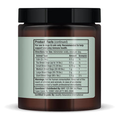 Dr. Mercola Bark & Whiskers powder sprinkled into dog bowl for easy daily feeding