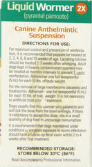 Durvet 2X Liquid Wormer puppy-dosing shows easy administration for young dogs.