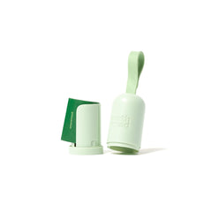 Earth Rated bag holder strap on leash demonstrates quick-access convenience during strolls.