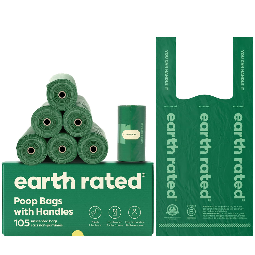 Earth Rated dog poop bags with handles open wide for easy pickup.