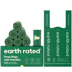Earth Rated dog poop bags with handles open wide for easy pickup.