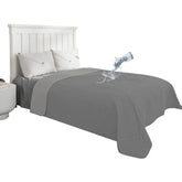 Easy-Going waterproof dog bed cover in gray on a sofa protects against spills