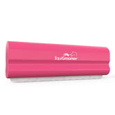 EquiGroomer EasyGroomer pink deshedding brush holding closeup for efficient fur removal.