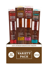 Etta Says Yumm Sticks variety pack open for dogs, showcasing assorted flavors.