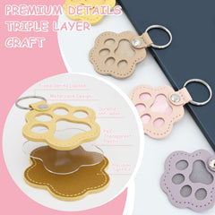 Evowatt pink paw keychain close-up showing soft, durable leather for daily carry.