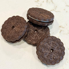 Exclusively Dog Carob Sandwich Cremes ingredients closeup with premium natural components and no by-products.