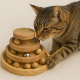 Eximious India interactive cat toy track-ball tower with nine spinning balls for mental engagement.