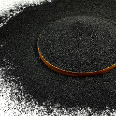 FANTIAN 5lb black aquarium silica sand closeup shows smooth texture for a sleek tank base.