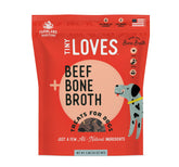 Farmland Traditions Tiny Loves Jerky Trainer packaging shows USA-made quality and bone broth appeal.
