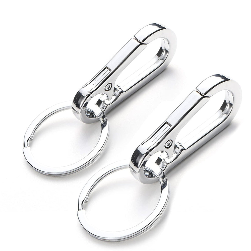 Fenmor dog-tag-clip closeup shows stainless steel durability for secure pet ID during play.
