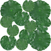 FFNIU 12Pcs Lily Pads floating in pond for vibrant decor and koi-friendly ambiance.