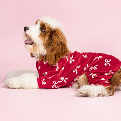 Fitwarm Bowknot Dog Pajamas fabric closeup; soft polyester-spandex blend with cozy feel.