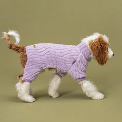 Fitwarm lavender fleece dog onesie on a small dog during a walk, warmth and mobility