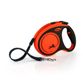 FLEXI New Classic orange front view shows controlled freedom for dogs up to 77 lbs