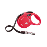 FLEXI New Classic tape leash red 10ft in use providing controlled freedom for a small dog.