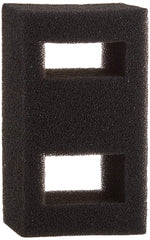 Fluval Flex foam filter block close-up shows debris-capture pores.