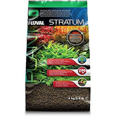Fluval Plant and Shrimp Stratum pour shows nutrient-rich substrate for vibrant plant growth.