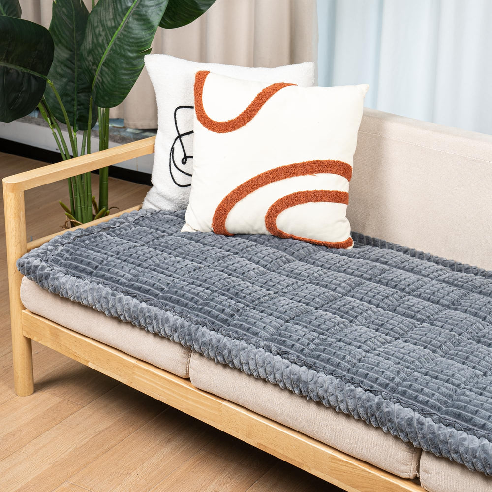 Flying Paws washable dog couch cover on sofa with anti slip protection keeps furniture clean.