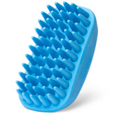 Freshly Bailey rubber curry brush in hand for easy grooming and control.