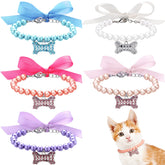 Frienda five-pcs pet pearl necklace purple set adds festive charm for pets.