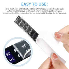 Frienda thermometer strip on fermentation tanks monitors 64-93°F range during brew.