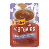 Friskies Lil' Gravies Roasted Turkey Flavor pouch pours gravy to top dry kibble