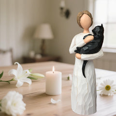 FRUMOASA wood-carved dress statue detail highlights craftsmanship.