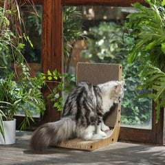FUKUMARU cat-scratcher-horizontal-lounge-bed demonstrates comfy horizontal rest and a cat-friendly nap spot.