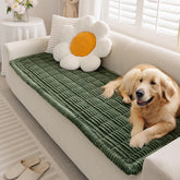 Funny Fuzzy pet couch cover in dark green protects sofa from fur and stains.