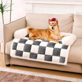 FUNNY FUZZY pet couch cover on a sofa with cream plaid fabric and furniture protection