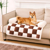 Funny Fuzzy pet couch cover on sofa protects fabric with anti-slip grip.