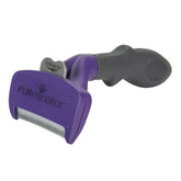 FURminator deShedding tool close-up showing ergonomic handle for comfortable grooming.