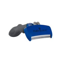 FURminator undercoat deshedding tool in action removing loose hair during grooming